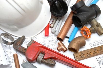 Plumbing parts, tools, and plans used by Drain Genie.